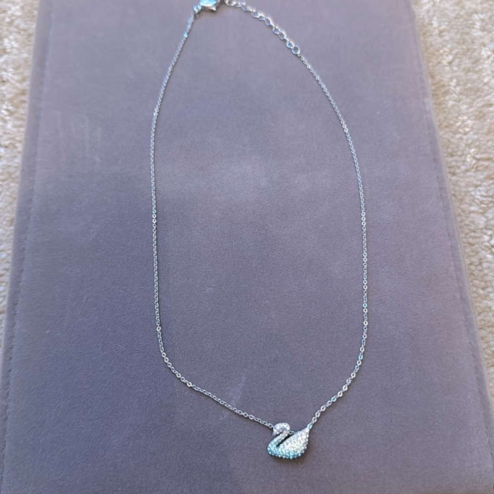 Authentic Swarovski blue/silver crystal swan necklace. NWOT.